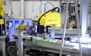 Fanuc vision-guided robotics with pick-and-place capabilities.