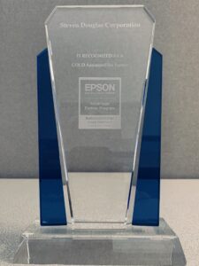 Crystal award with blue side panels, presented to Steven Douglas Corp., recognizing them as a GOLD Automate Elite Partner in the Epson Advantage Partner Program.