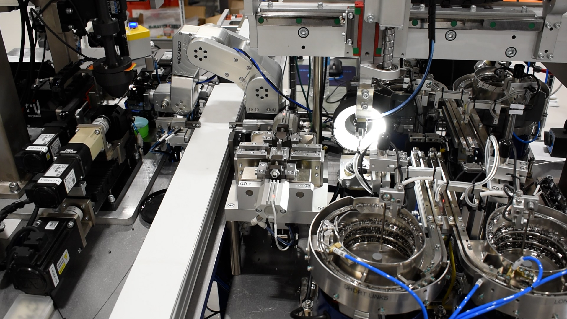 Microscopic Medical Device Assembly Image looking down on machine