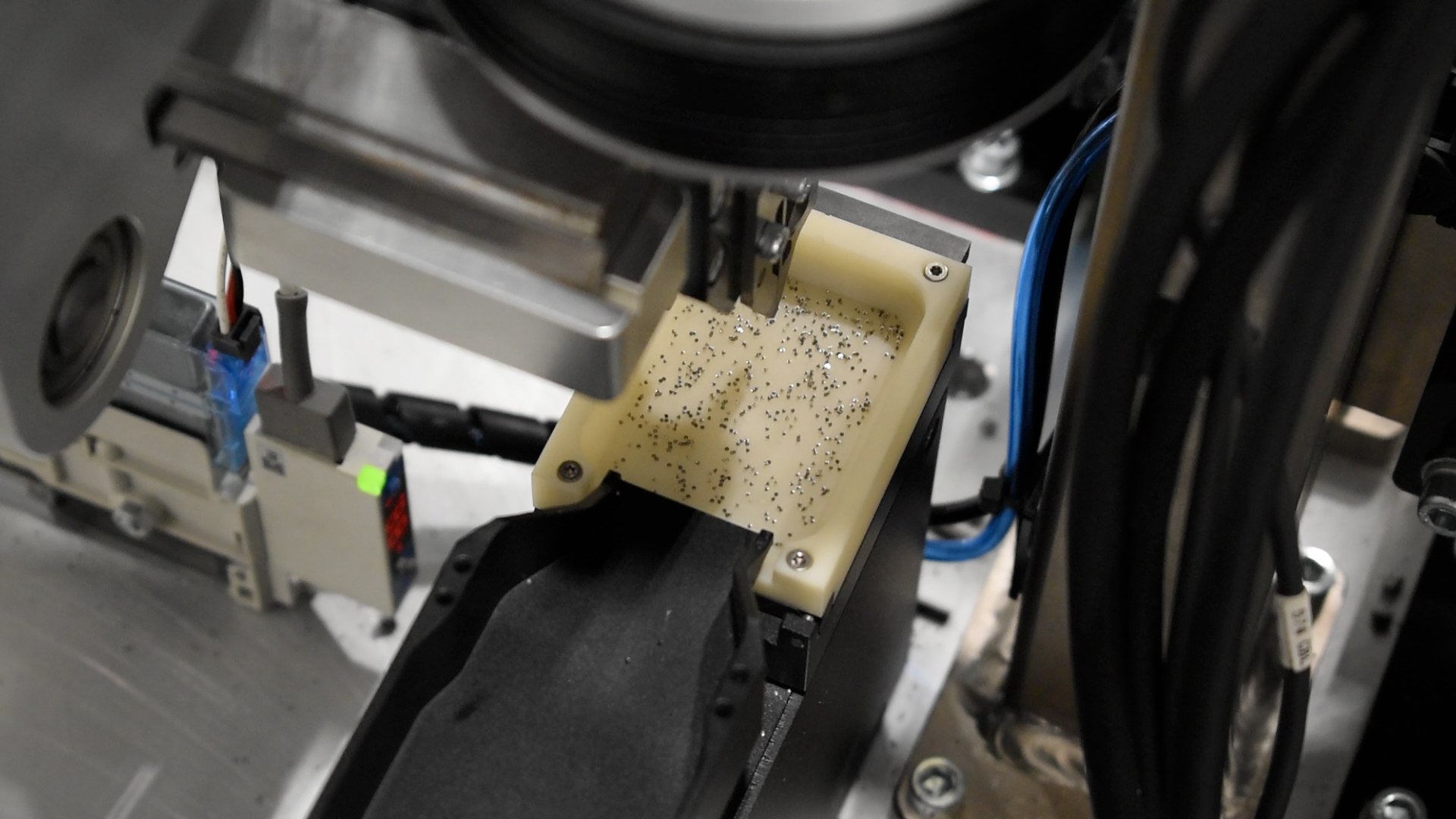 Microscopic Medical Device Assembly Images Asyril part picking station
