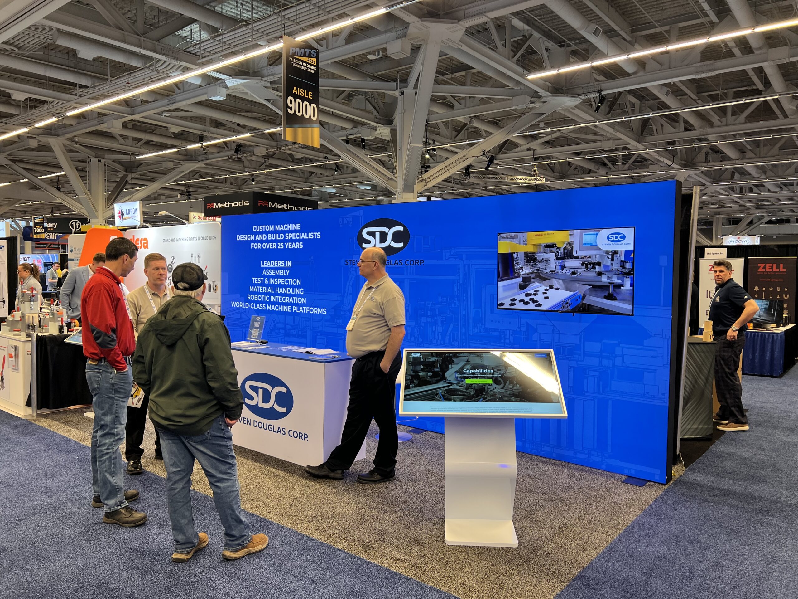 Talking with PMTS attendees at the SDC booth