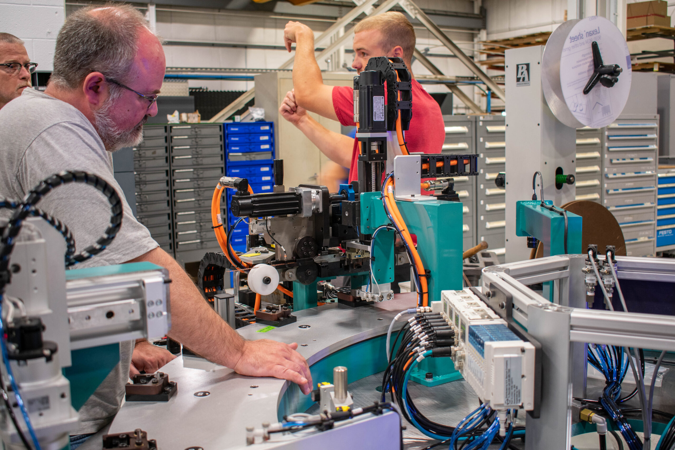 Engineers working on a machine