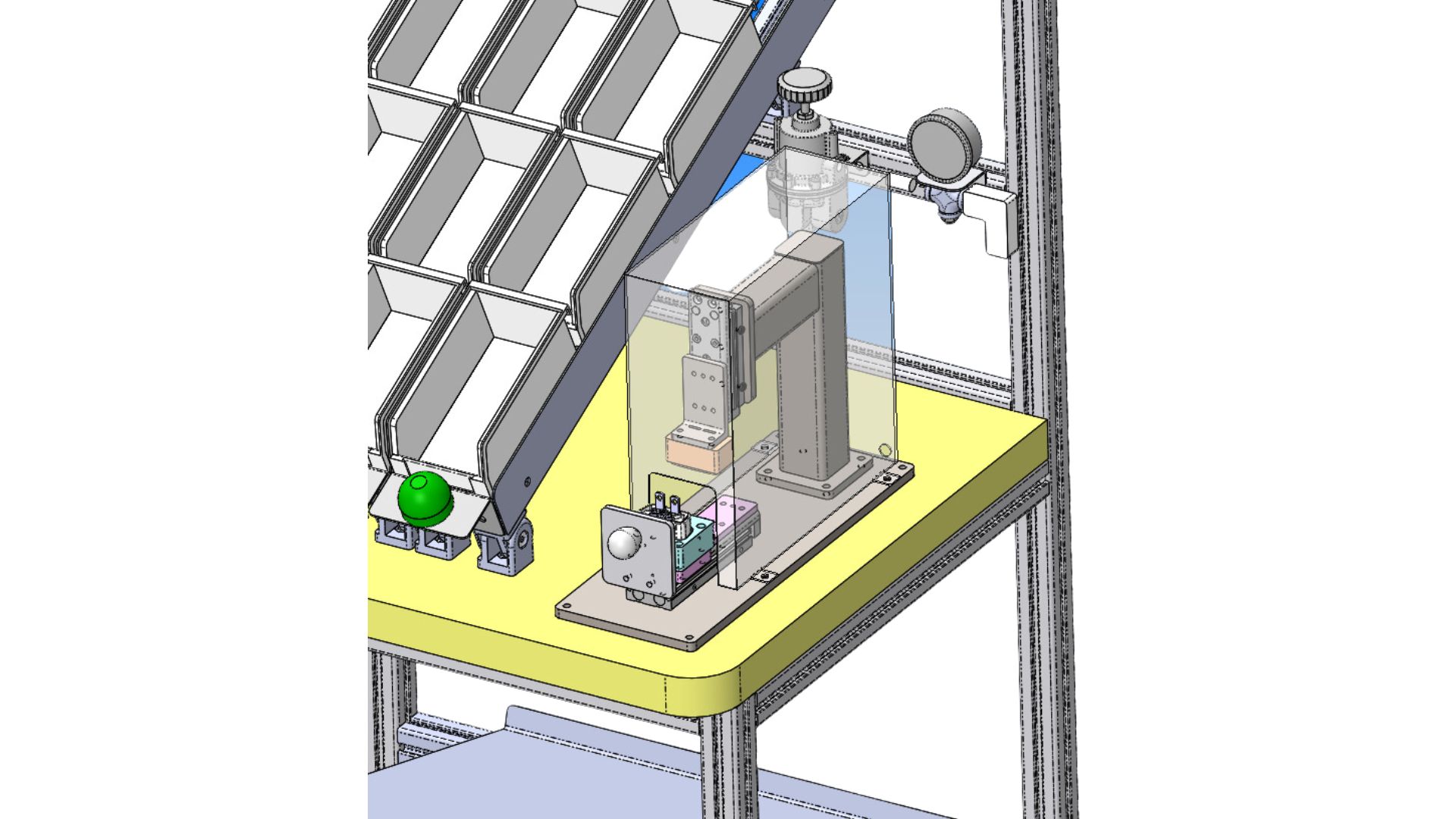 Automated assembly station with part bins, robot arm, and safety enclosure on a yellow topped workstation framework.