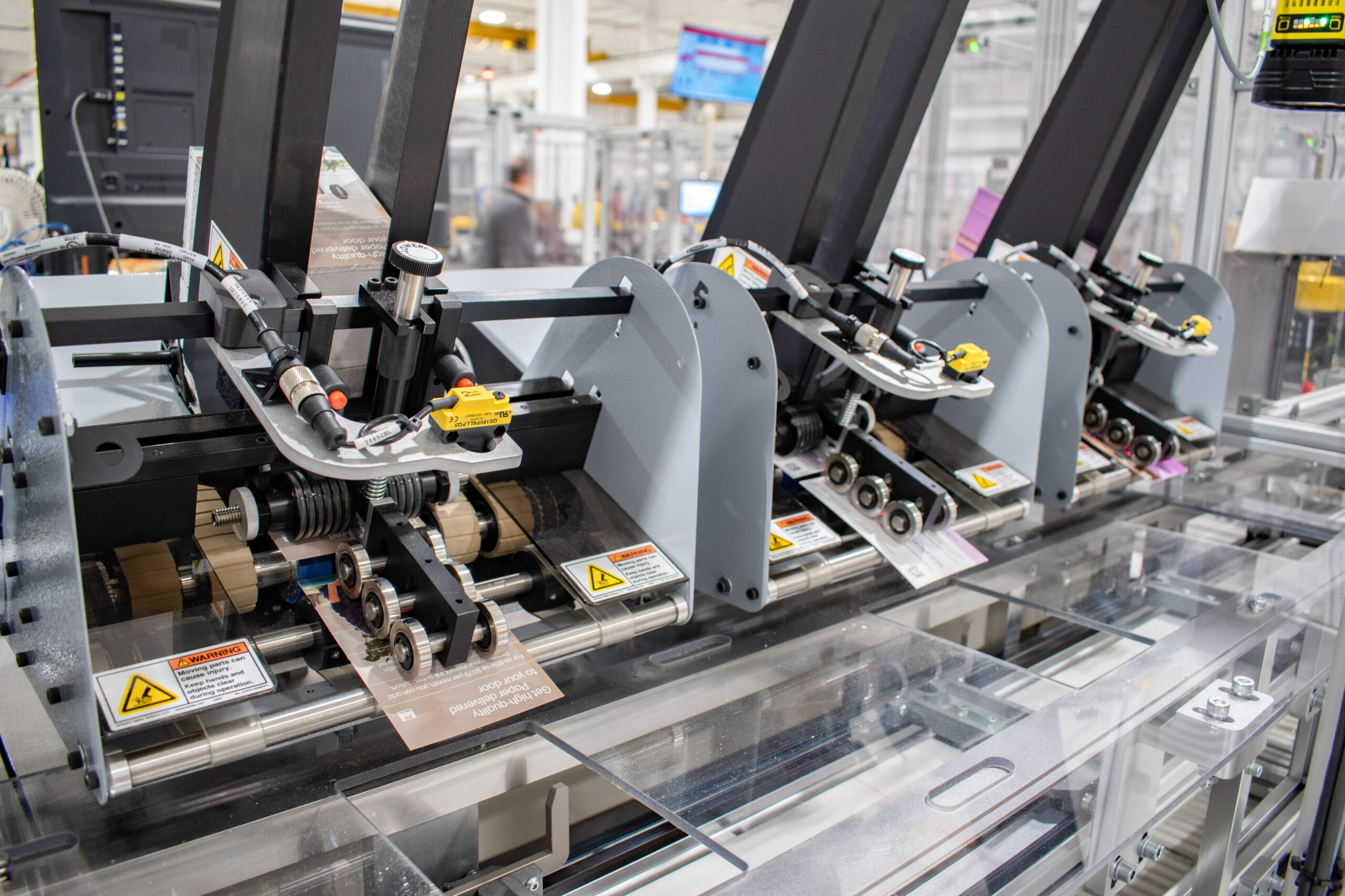 Automated media feeder integrated on a production line