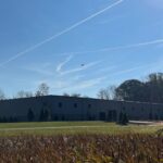 Rear of SDC building in the fall time with the sun out.