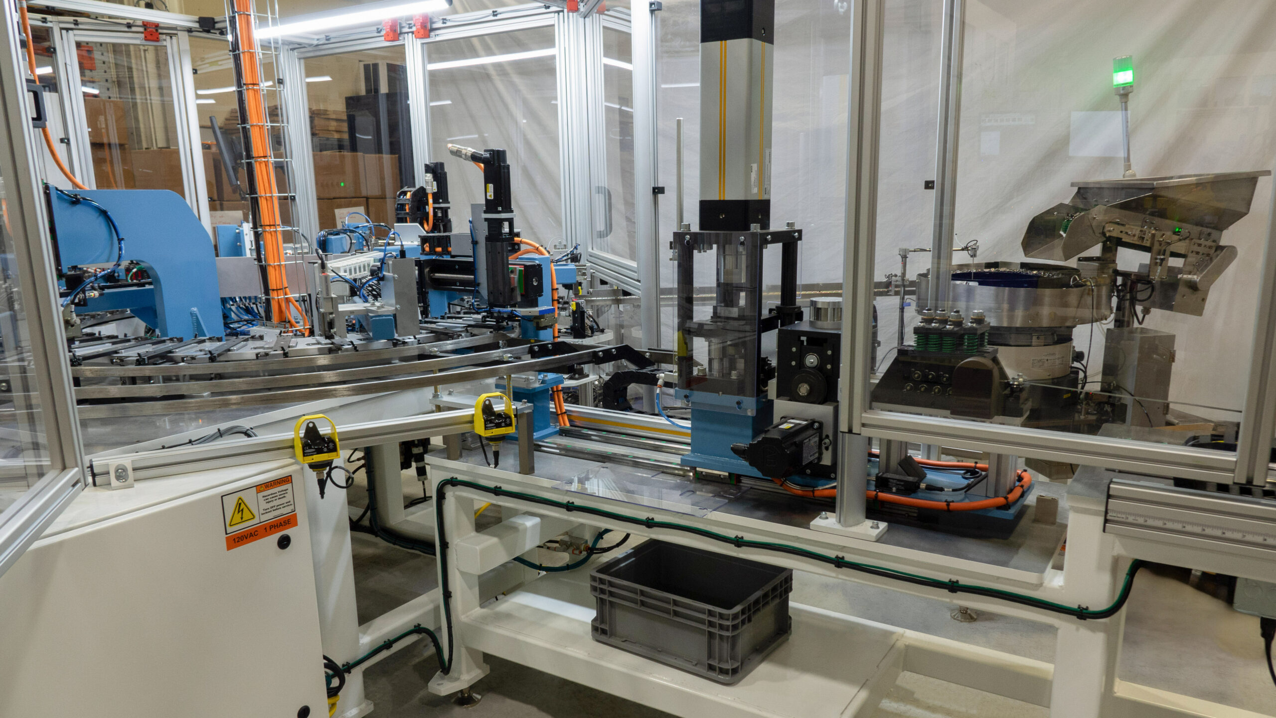 Stamping and cutting equipment integrated on an automated assembly machine