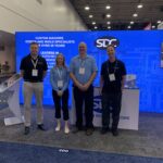 Some of the SDC booth team with robotics supplier, Mecademic