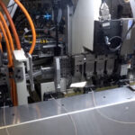 Wire harness machine loop loading section