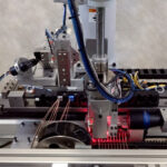 Wire harness machine overview with pink light