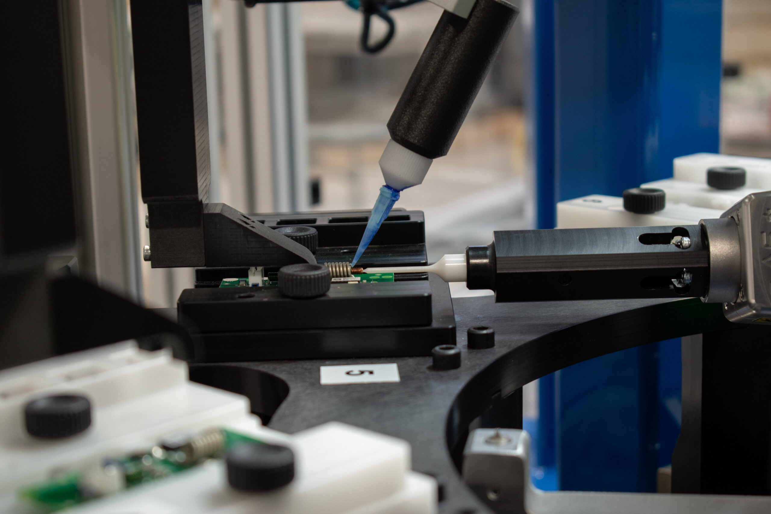 Microscopic screwdriving and adhesive dispensing