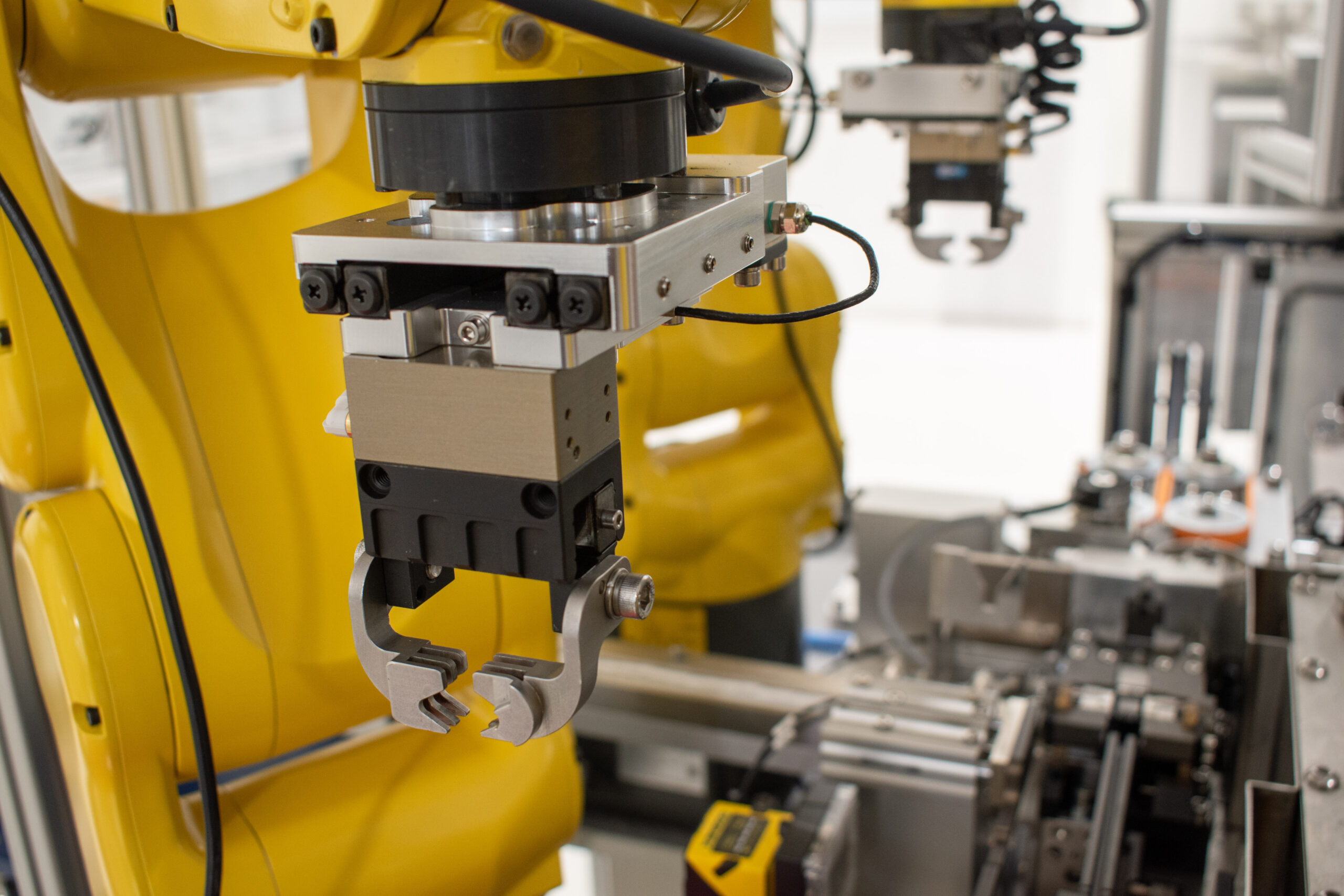 Custom robotic grippers for medical tubing