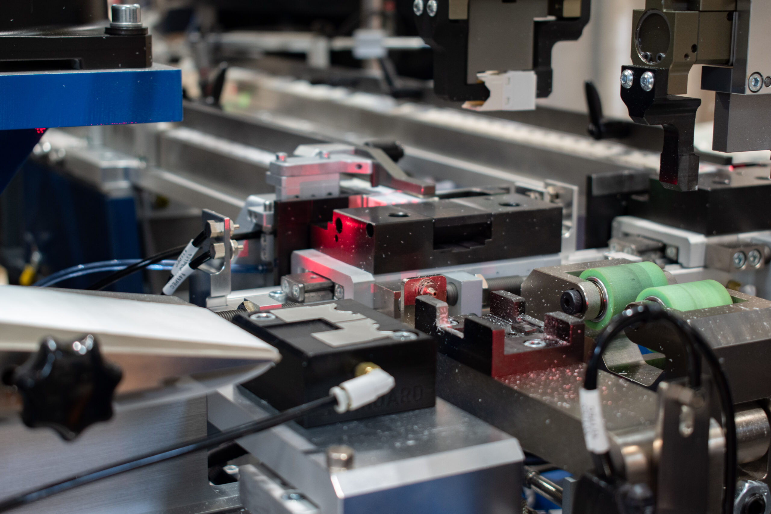 foil shielding ready to be applied to a jack module on an automated machine