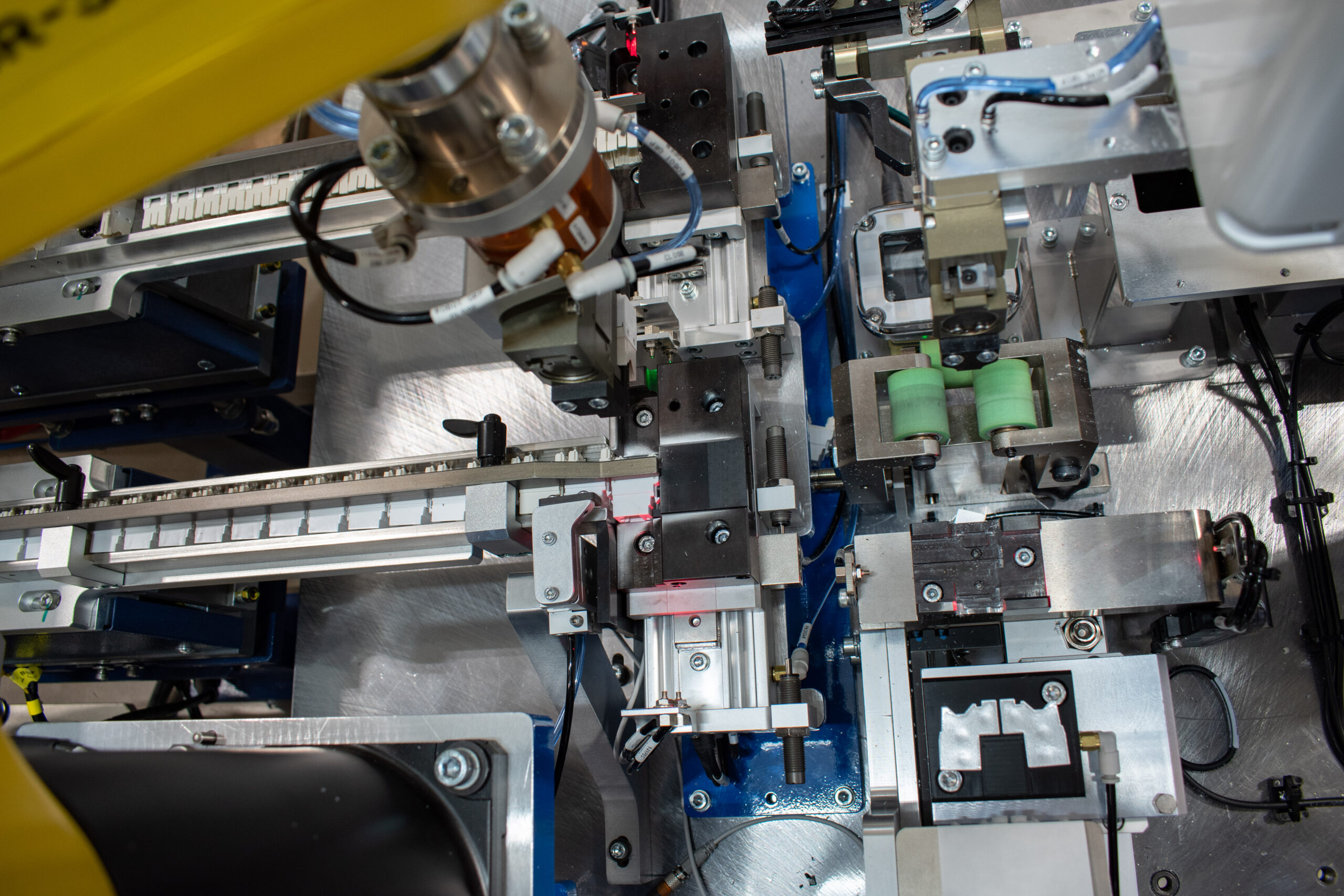 parts feeding view on a high-speed foil applicator machine