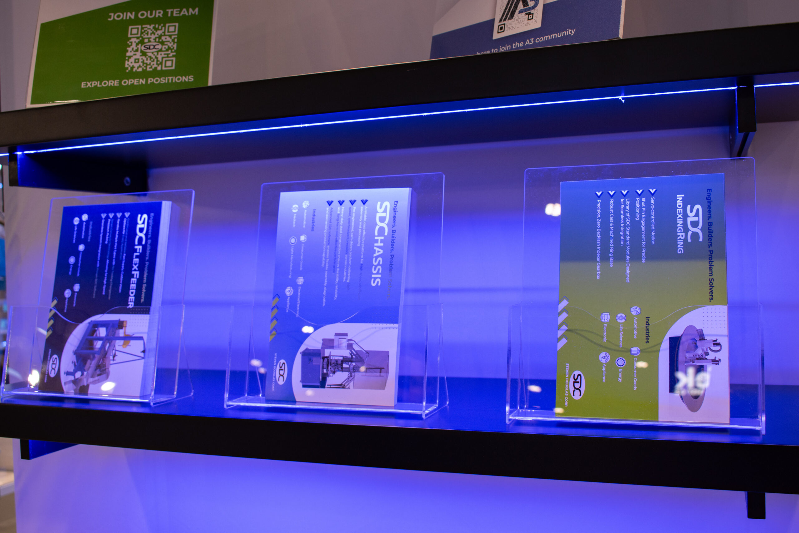 SDC's booth cards - the SDC Indexing Ring, SDChassis, and SDC Flex Feeder